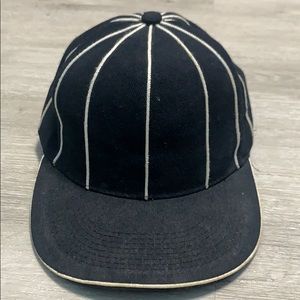 Leader: Black & White Striped Hat